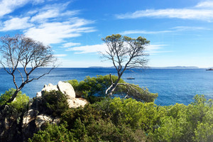 собственности ноги в воде на мысе Бенат